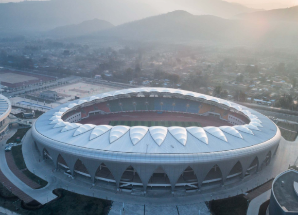The main stadium of Wenzhou Olympic Sports Center lights up for the first time